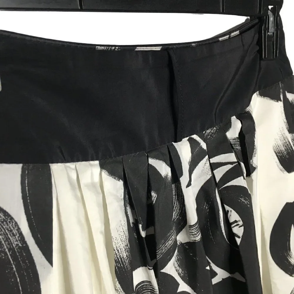Young women black and white silky polyester skirt